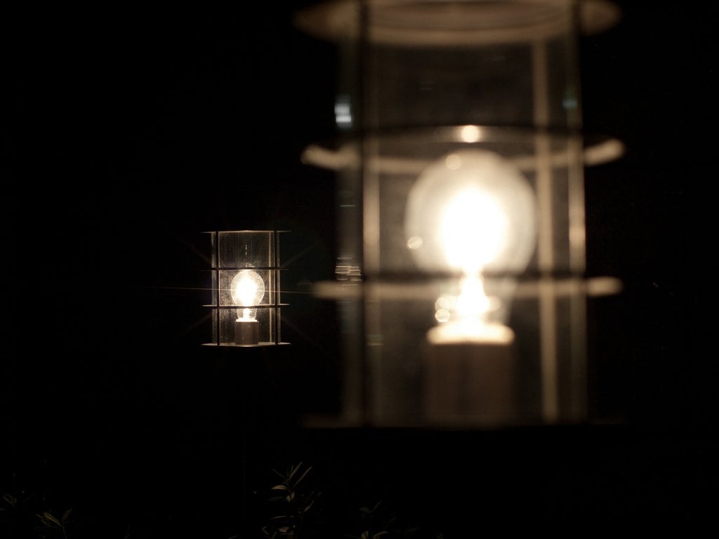 A small lantern glowing in the dark